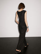 Asymmetric top with knot detail