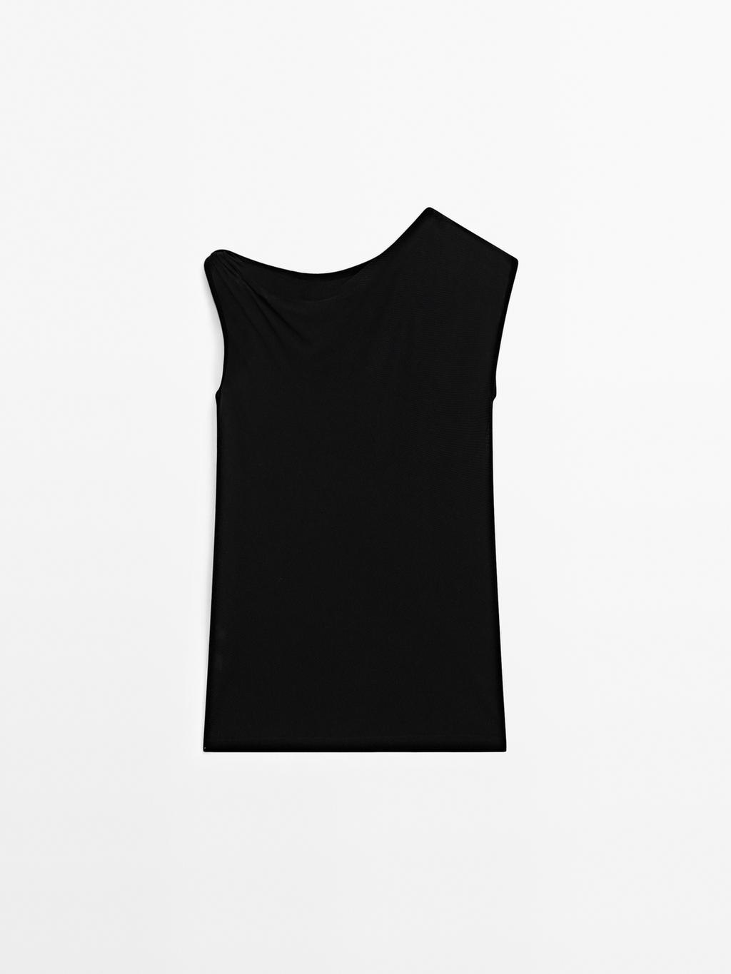 Asymmetric top with knot detail