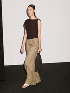 Draped neckline top with brooch detail