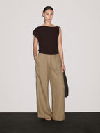 Draped neckline top with brooch detail