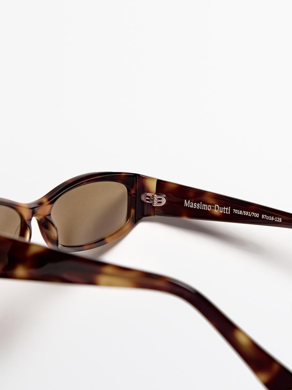 Small elongated sunglasses