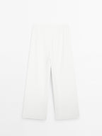 High-waist palazzo trousers - STUDIO