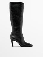 High-heel boots with elastic gores on the leg
