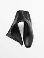 Leather stiletto heel boots