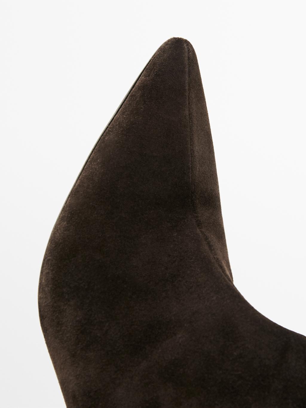 Heeled split leather boots