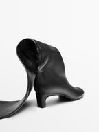 Stretch high-heel boots