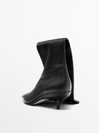 Stretch heeled boots - LIMITED