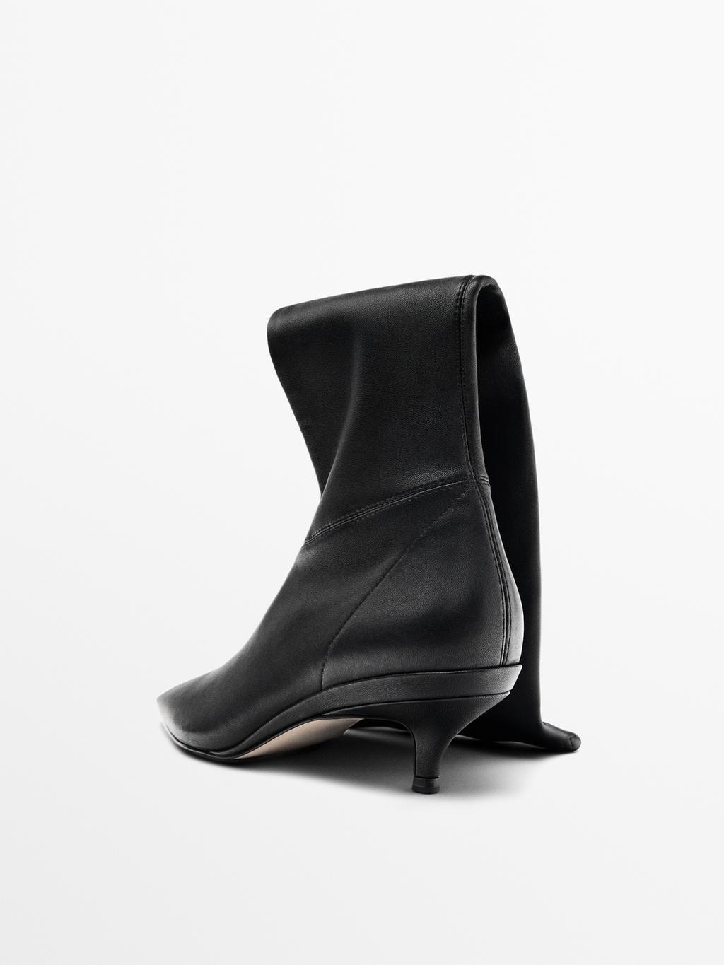 Stretch heeled boots - LIMITED