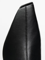 Stretch heeled boots - LIMITED