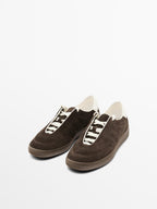Split suede trainers with topstitching