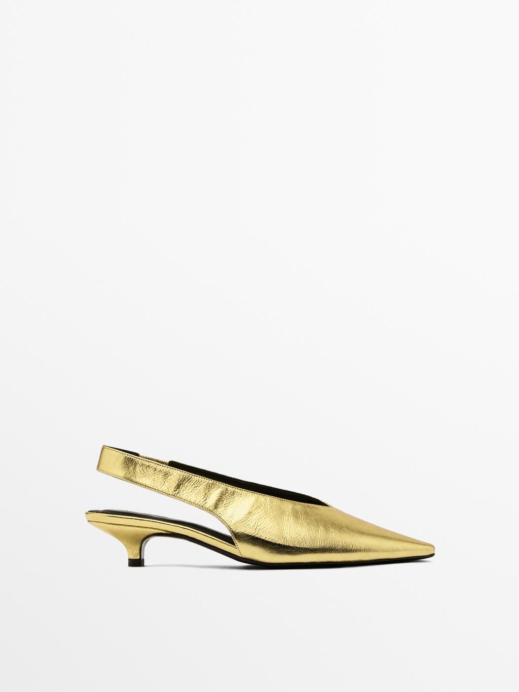 Gold high-heel slingback shoes