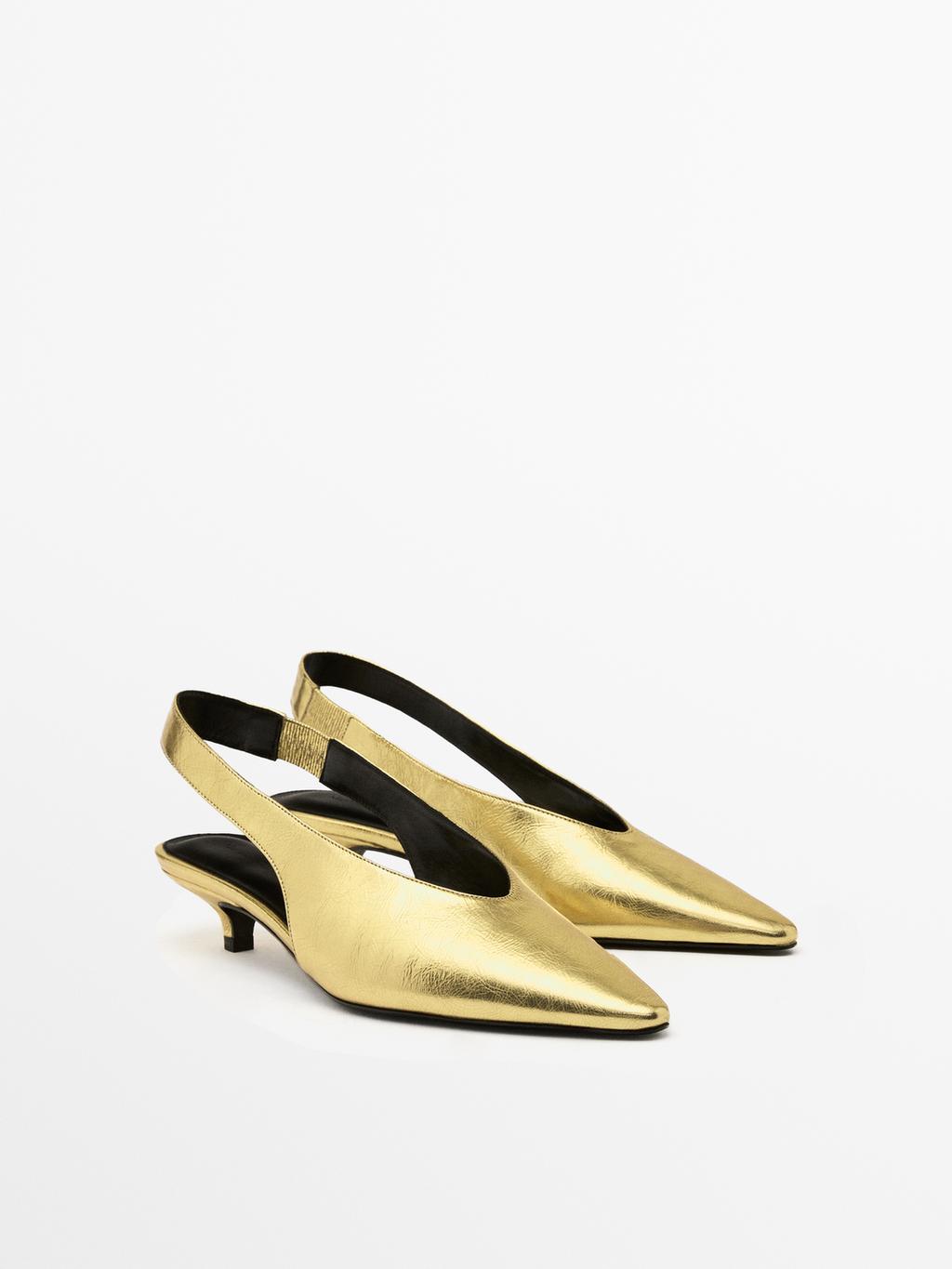 Gold high-heel slingback shoes