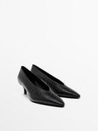 Ostrich print leather court shoes