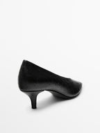 Ostrich print leather court shoes
