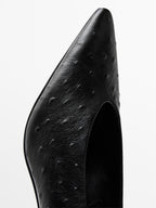 Ostrich print leather court shoes