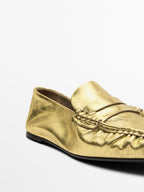 Gold penny loafers