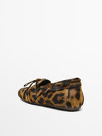 Leopard print deck shoes