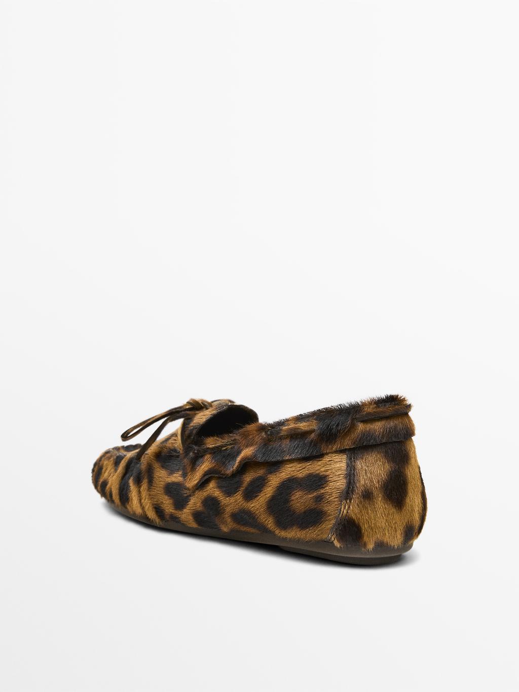 Leopard print deck shoes