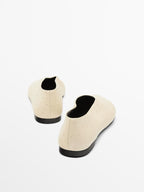 Ostrich print leather ballet flats