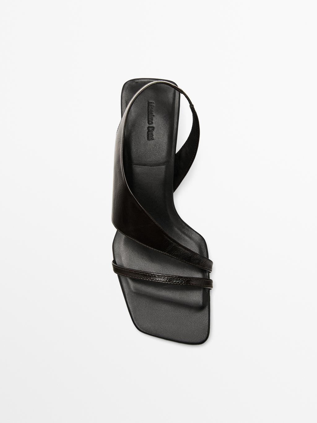 Asymmetric heeled sandals