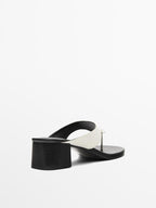 Heeled sandals with toe divider