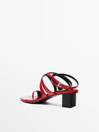 Leather sandals with criss-cross straps