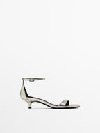 High-heel sandals with metallic strap