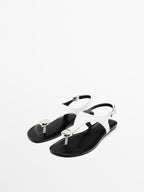 Flat leather sandals with embellished detail