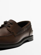 Oiled leather deck shoes