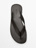Leather sandals with toe divider