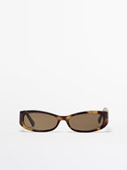 Small elongated sunglasses